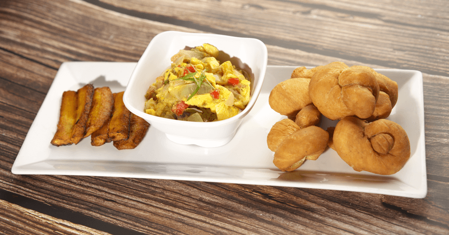 Authentic Jamaican ackee and saltfish served with fried festivals and sweet plantain