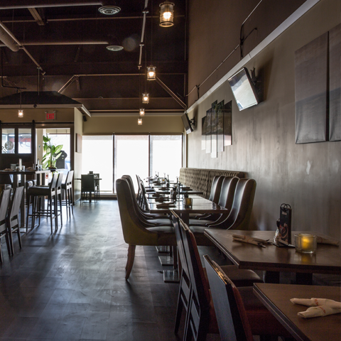 Warm and inviting restaurant interior with dimmed lighting – thumbnail view